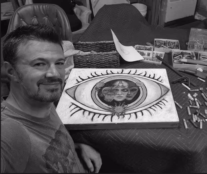 Ethan Elkins creating the original eye artwork for Ascensão: Revolution